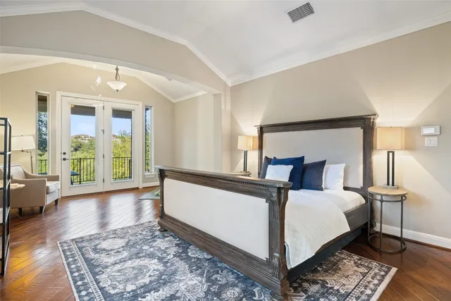 a bed room with a bed and a window