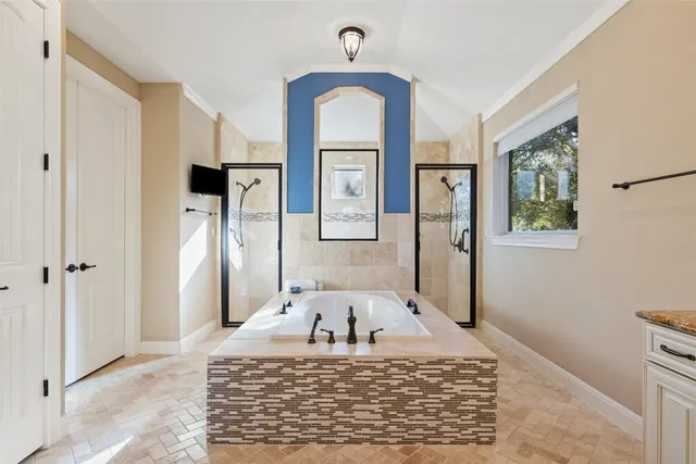 a view of a hallway with windows