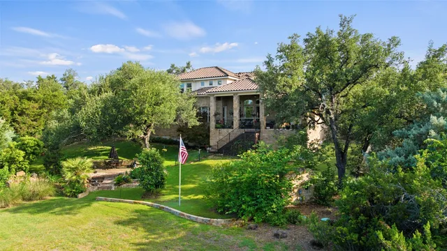 a backyard of a house with lots of green space