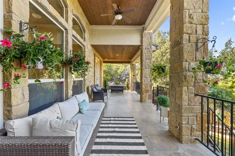 a view of a porch with furniture