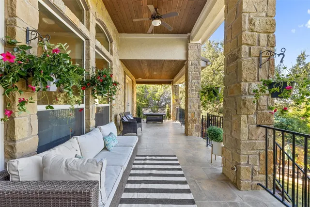 a view of a porch with furniture