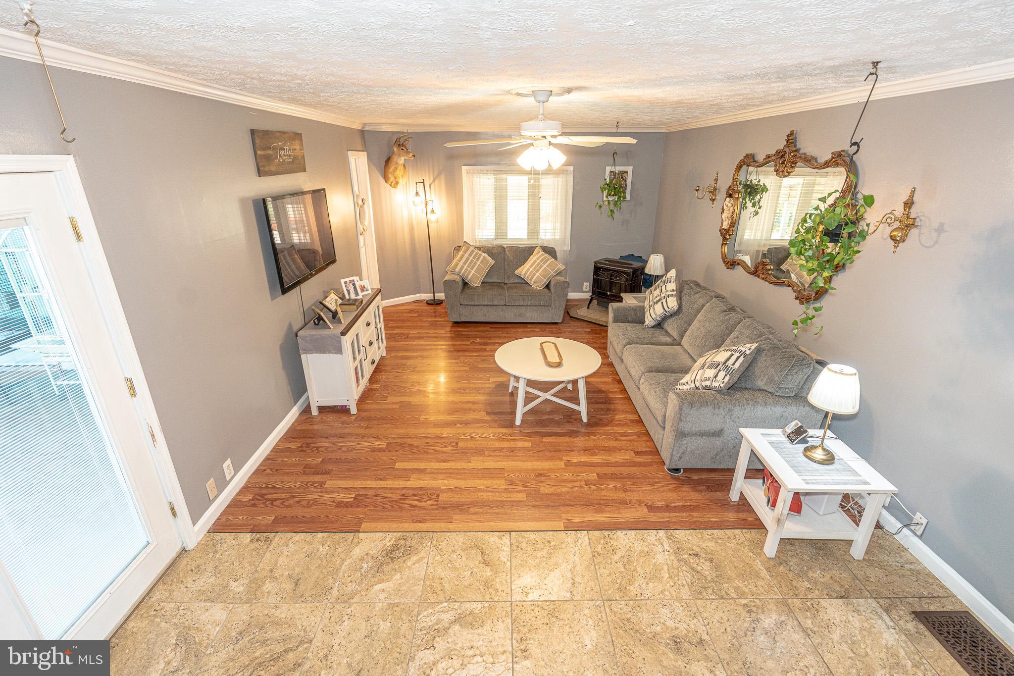 8514 Sandy Plains Road Dundalk, MD 21222 - Photo 25 of 34 a view of a living room and dining room