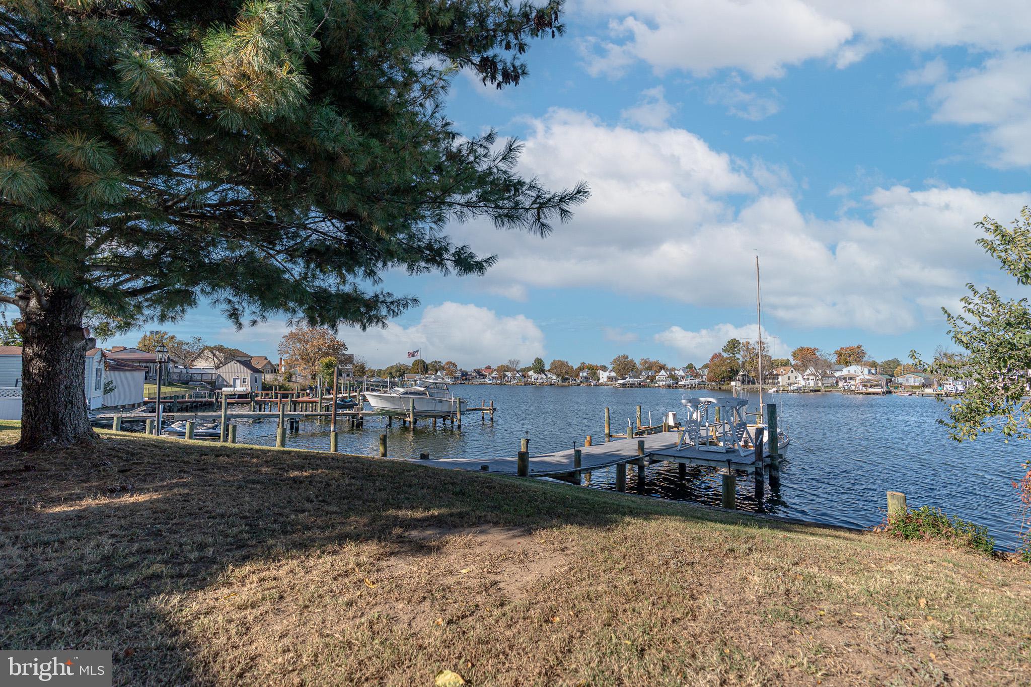 8514 Sandy Plains Road Dundalk, MD 21222 - Photo 30 of 34 a view of a lake with houses