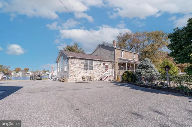 a view of a house with a garden