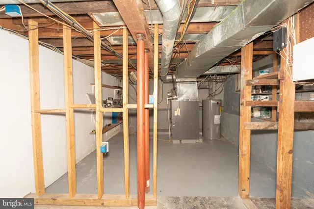a view of a couch with wooden fence