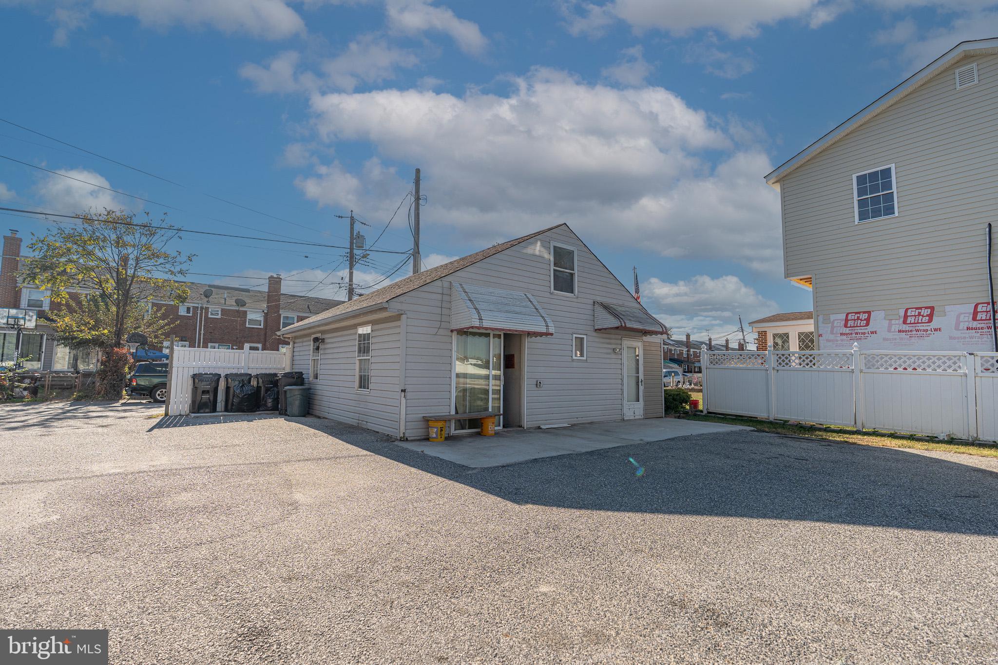 8514 Sandy Plains Road Dundalk, MD 21222 - Photo 7 of 34 a view of a house with a snow in front of house
