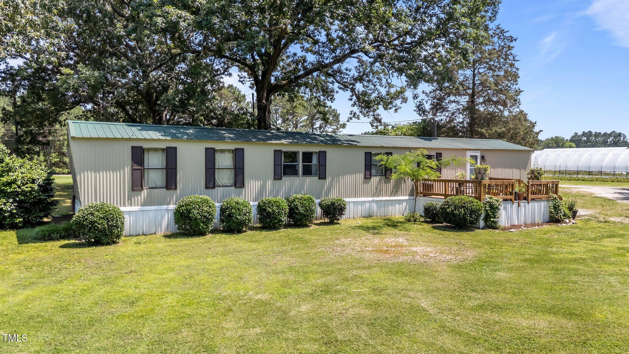 1355 Sykes Road Spring Hope, NC 27882 - Photo 3 of 39 2-web-or-mls-DJI_20250603144032_0753_D