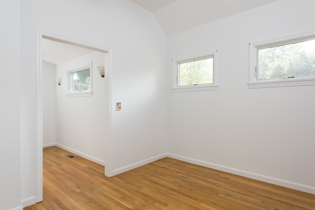 39 Route 130 Forestdale, MA 02644 - Photo 13 of 29 an empty room with wooden floor and windows