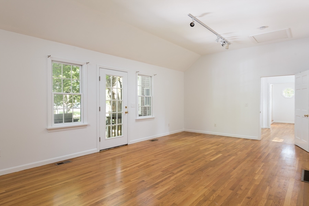 39 Route 130 Forestdale, MA 02644 - Photo 14 of 29 a view of an empty room with wooden floor and a window