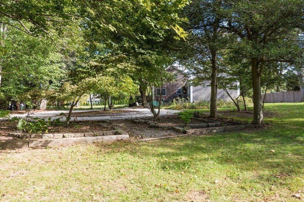39 Route 130 Forestdale, MA 02644 - Photo 17 of 29 a view of backyard of green space