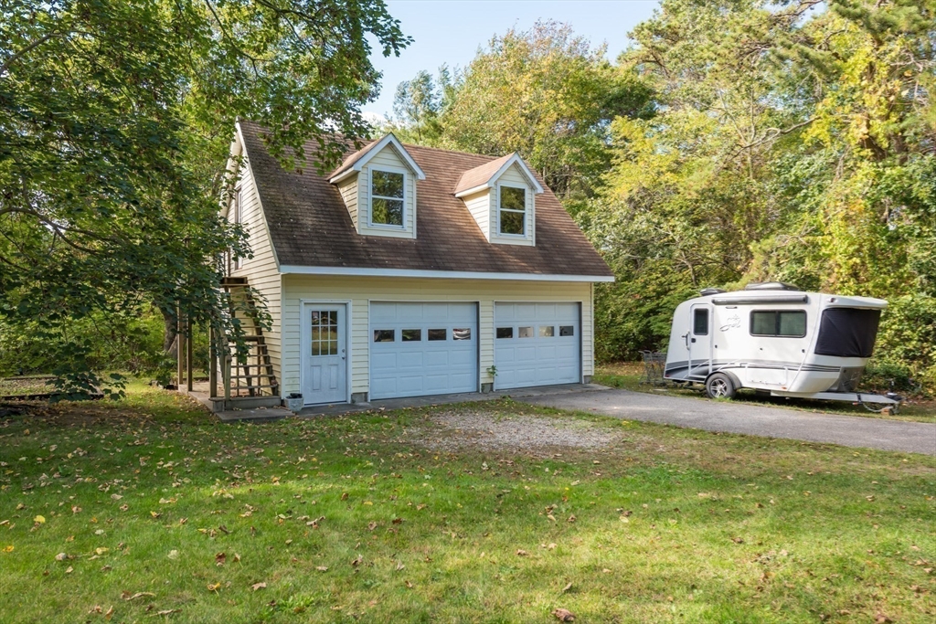 39 Route 130 Forestdale, MA 02644 - Photo 19 of 29 a front view of a house with a yard