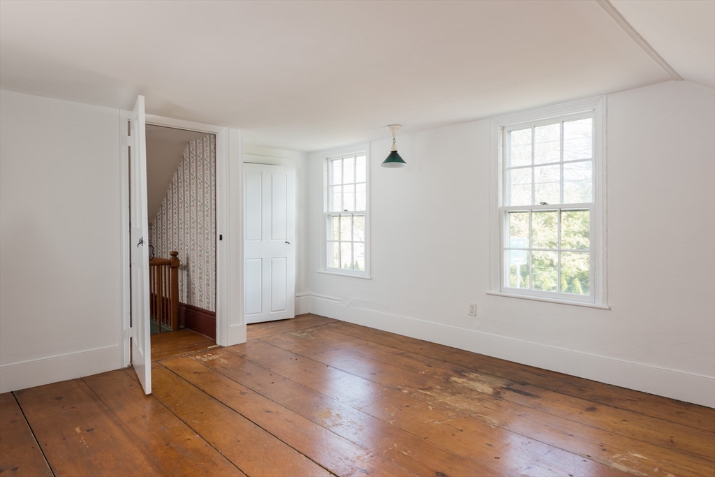 39 Route 130 Forestdale, MA 02644 - Photo 10 of 29 a view of an empty room with wooden floor and a window