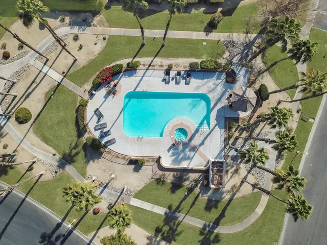 an aerial view of a swimming pool