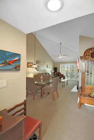 a living room with furniture and a table