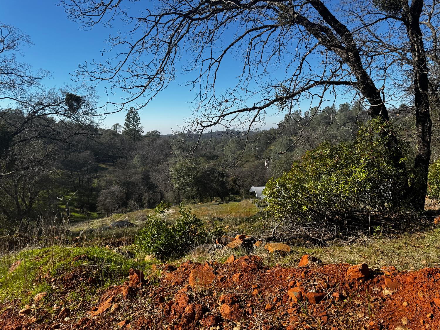 15806 Perimeter Road Grass Valley, CA 95949 - Photo 20 of 32 On a clear day the building pad for the home has views of the Sutter Buttes, the city lights and long range views of the coastal range