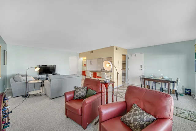 a stove top oven sitting inside of a kitchen
