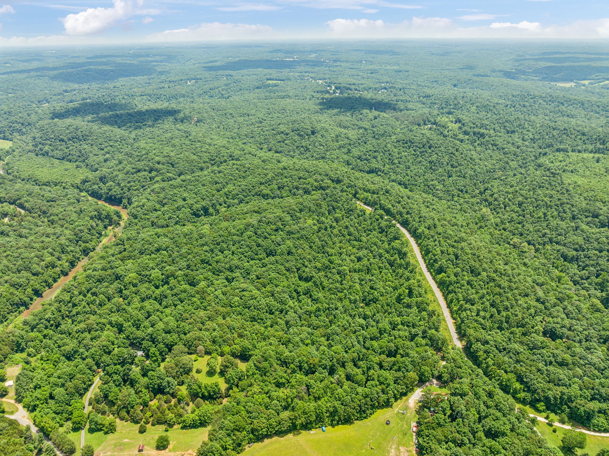 0 Piney River Road Bon Aqua, TN 37025 - Photo 2 of 19 a view of a yard with an outdoor space