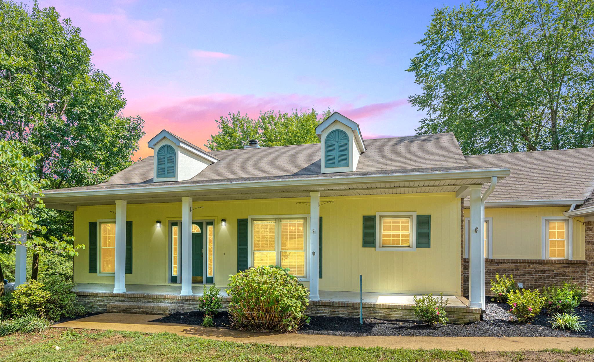 2204 Double Branch Road Columbia, TN 38401 - Photo 1 of 34 a front view of a house with a yard