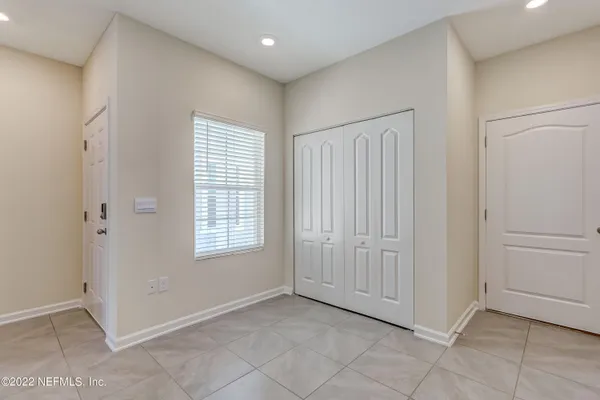 an empty room with windows