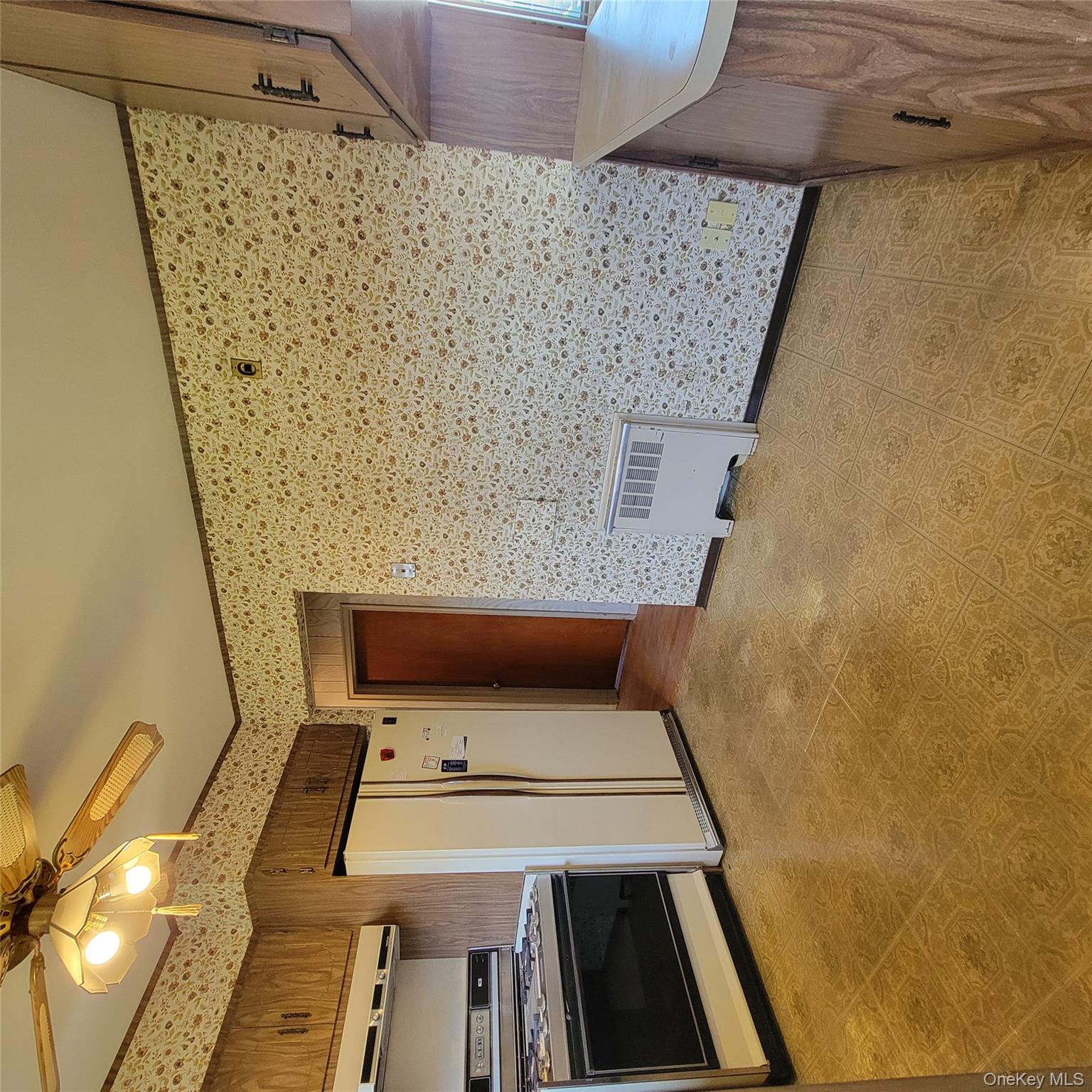3030 North Jerusalem Road Wantagh, NY 11793 - Photo 9 of 14 a view of kitchen with stainless steel appliances cabinets and a refrigerator
