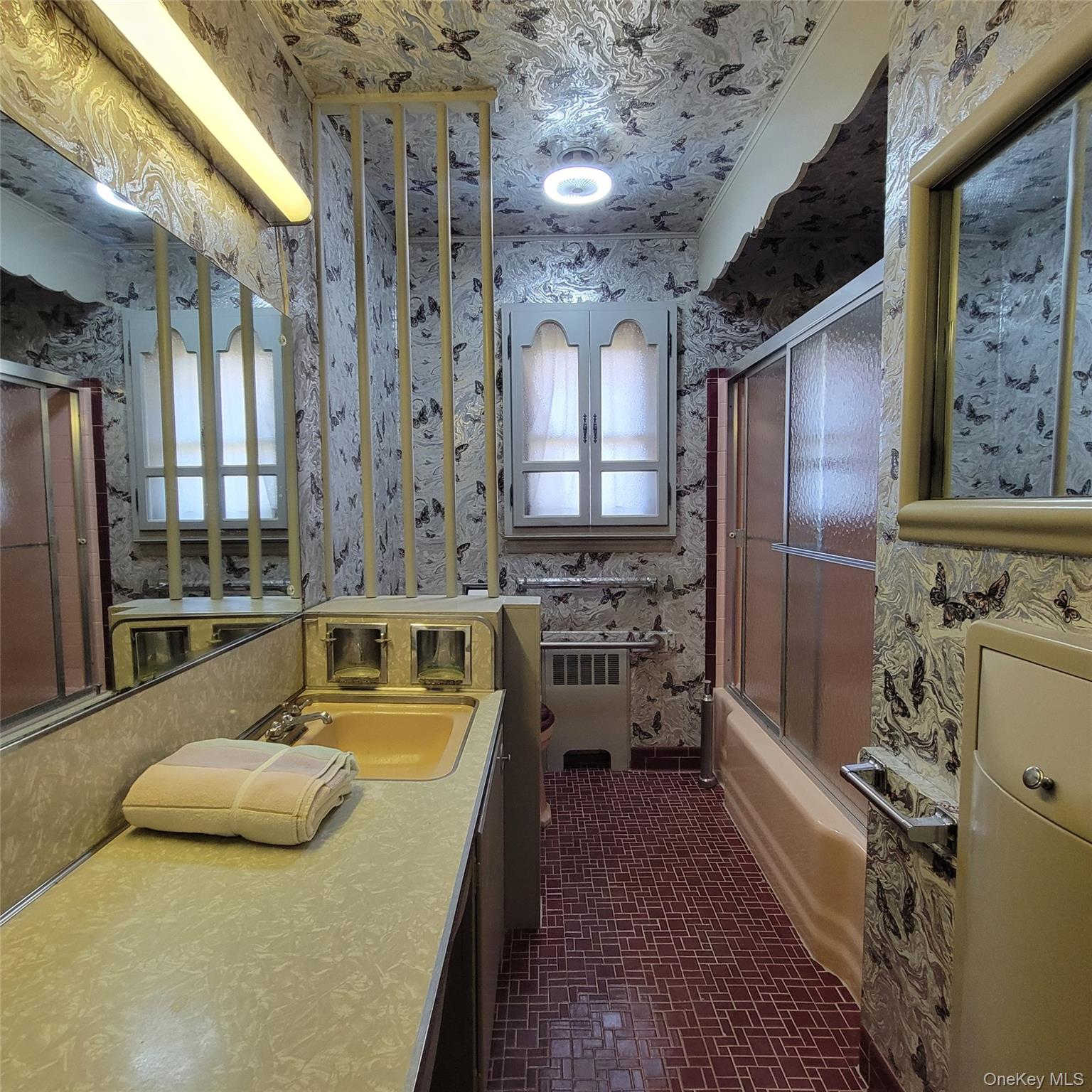 3030 North Jerusalem Road Wantagh, NY 11793 - Photo 10 of 14 a large kitchen with stainless steel appliances granite countertop a sink window and cabinets