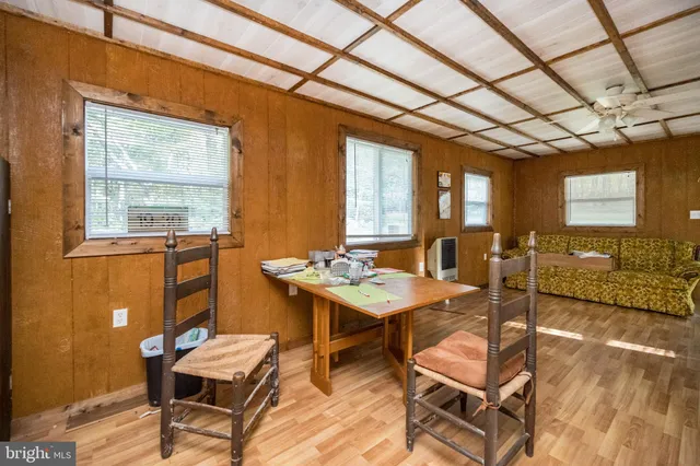 a view of a bathroom with a sink and glass door