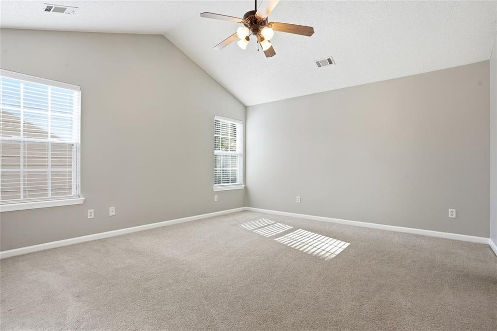 2157 Capella Circle Southwest Atlanta, GA 30331 - Photo 12 of 41 an empty room with windows and fan