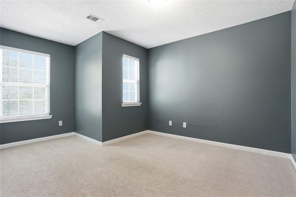 2157 Capella Circle Southwest Atlanta, GA 30331 - Photo 20 of 41 an empty room with windows and closet