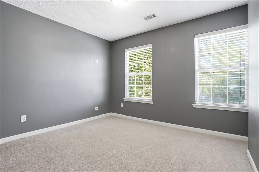 2157 Capella Circle Southwest Atlanta, GA 30331 - Photo 22 of 41 a view of an empty room with a window