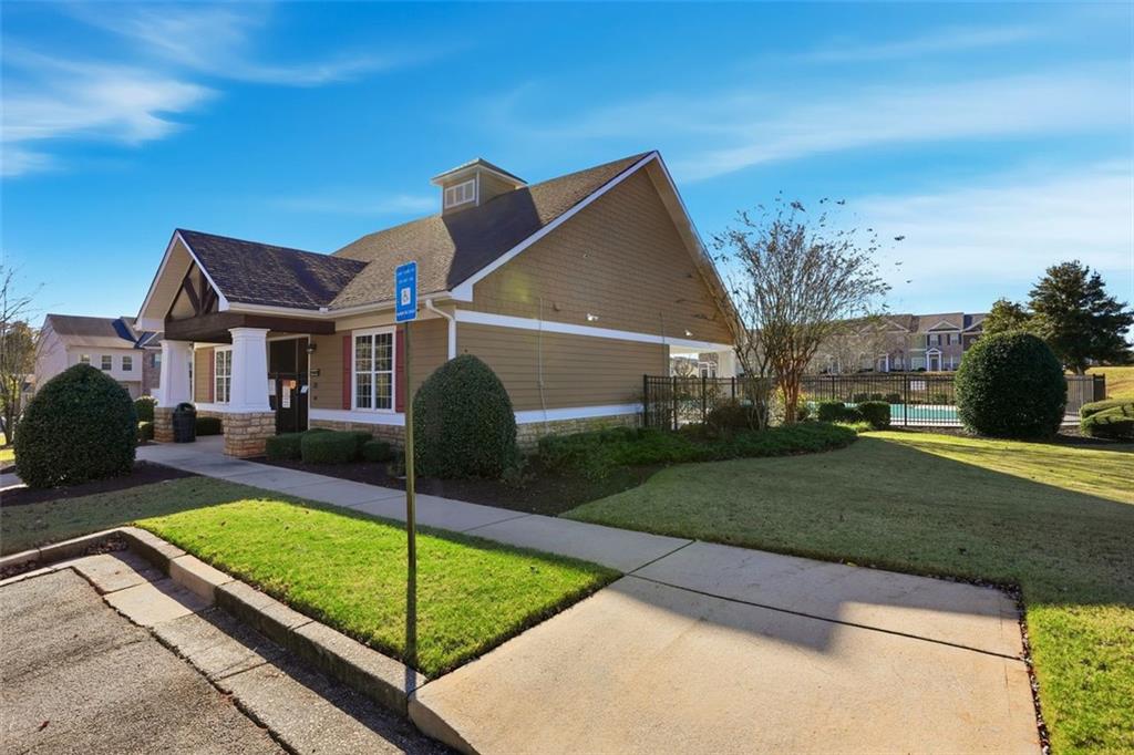 2157 Capella Circle Southwest Atlanta, GA 30331 - Photo 28 of 41 a front view of a house with a yard
