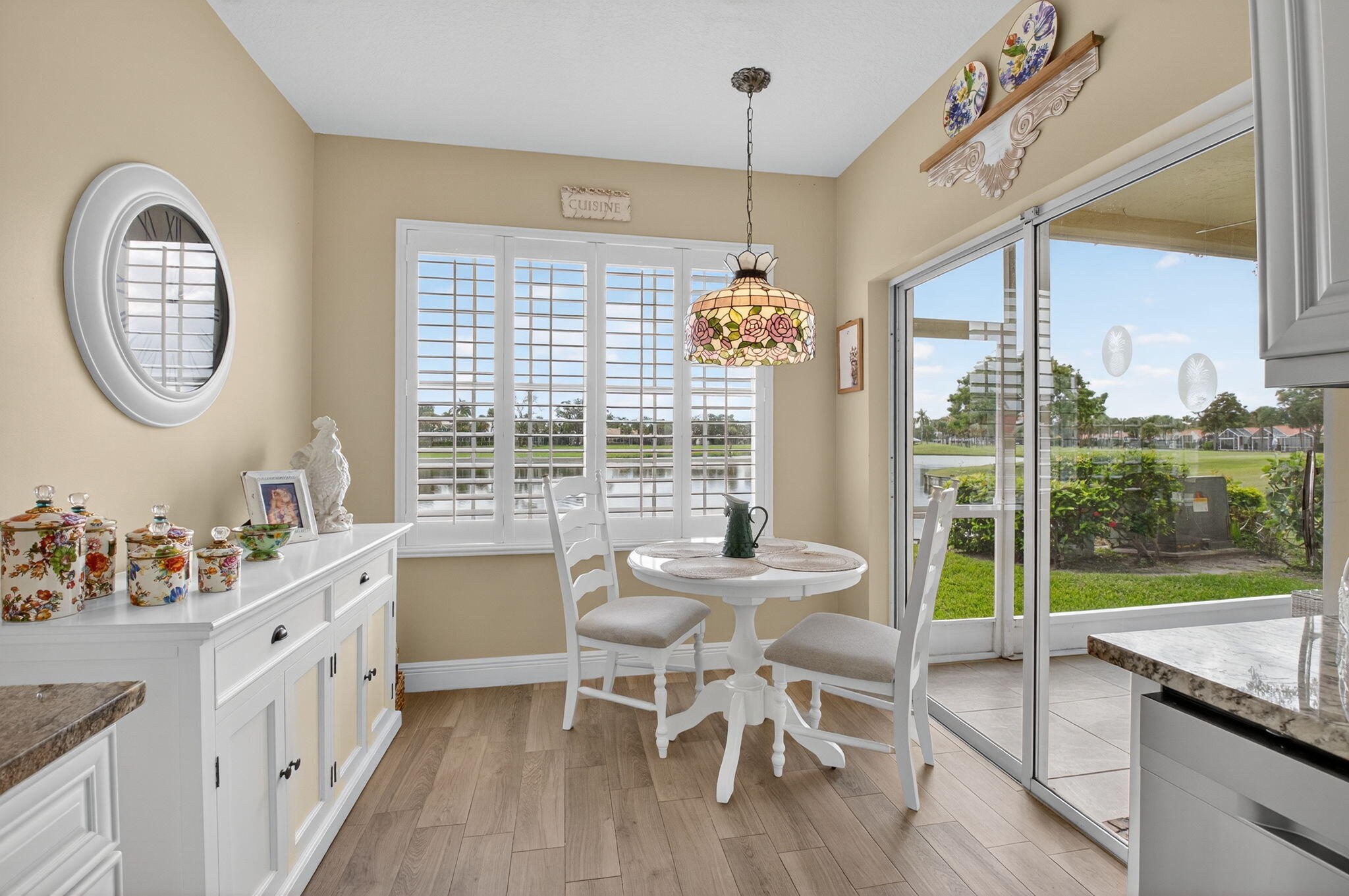 17287 Boca Club Boulevard, Unit 1 Boca Raton, FL 33487 - Photo 13 of 28 a view of a dining room with furniture window and outside view