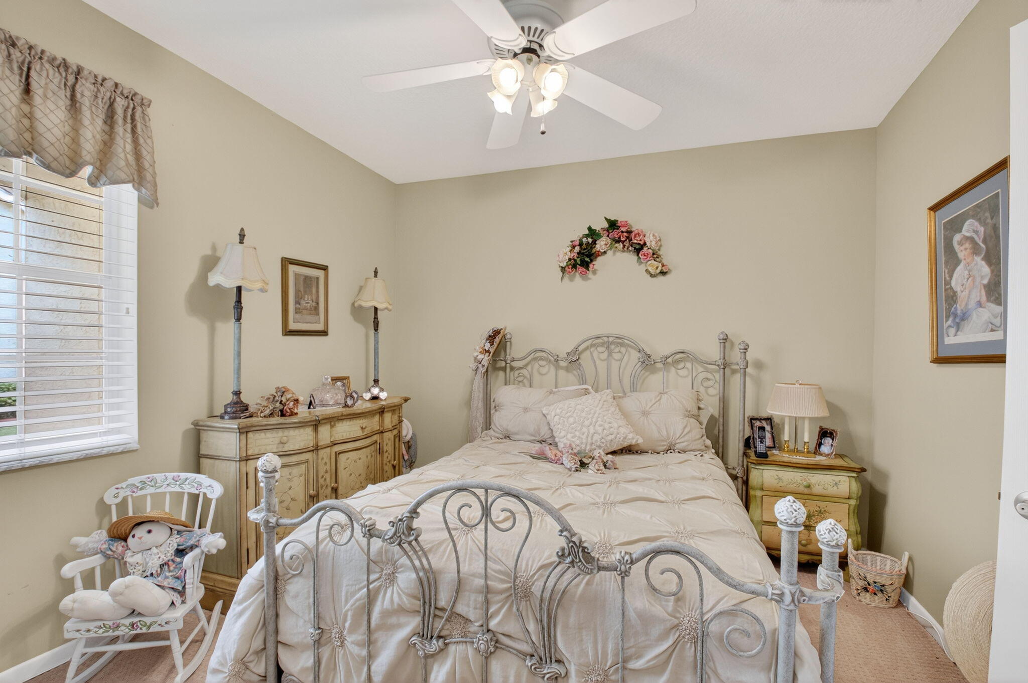 17287 Boca Club Boulevard, Unit 1 Boca Raton, FL 33487 - Photo 20 of 28 a bedroom with a bed and a chandelier