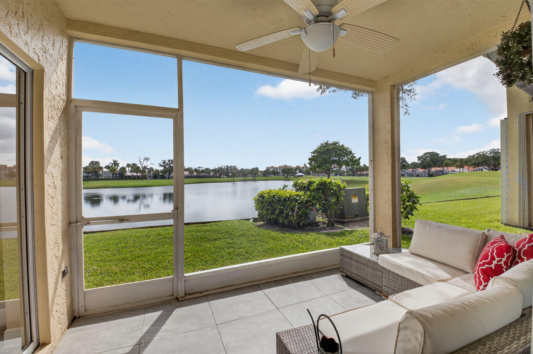 17287 Boca Club Boulevard, Unit 1 Boca Raton, FL 33487 - Photo 22 of 28 a view of a porch with furniture and garden