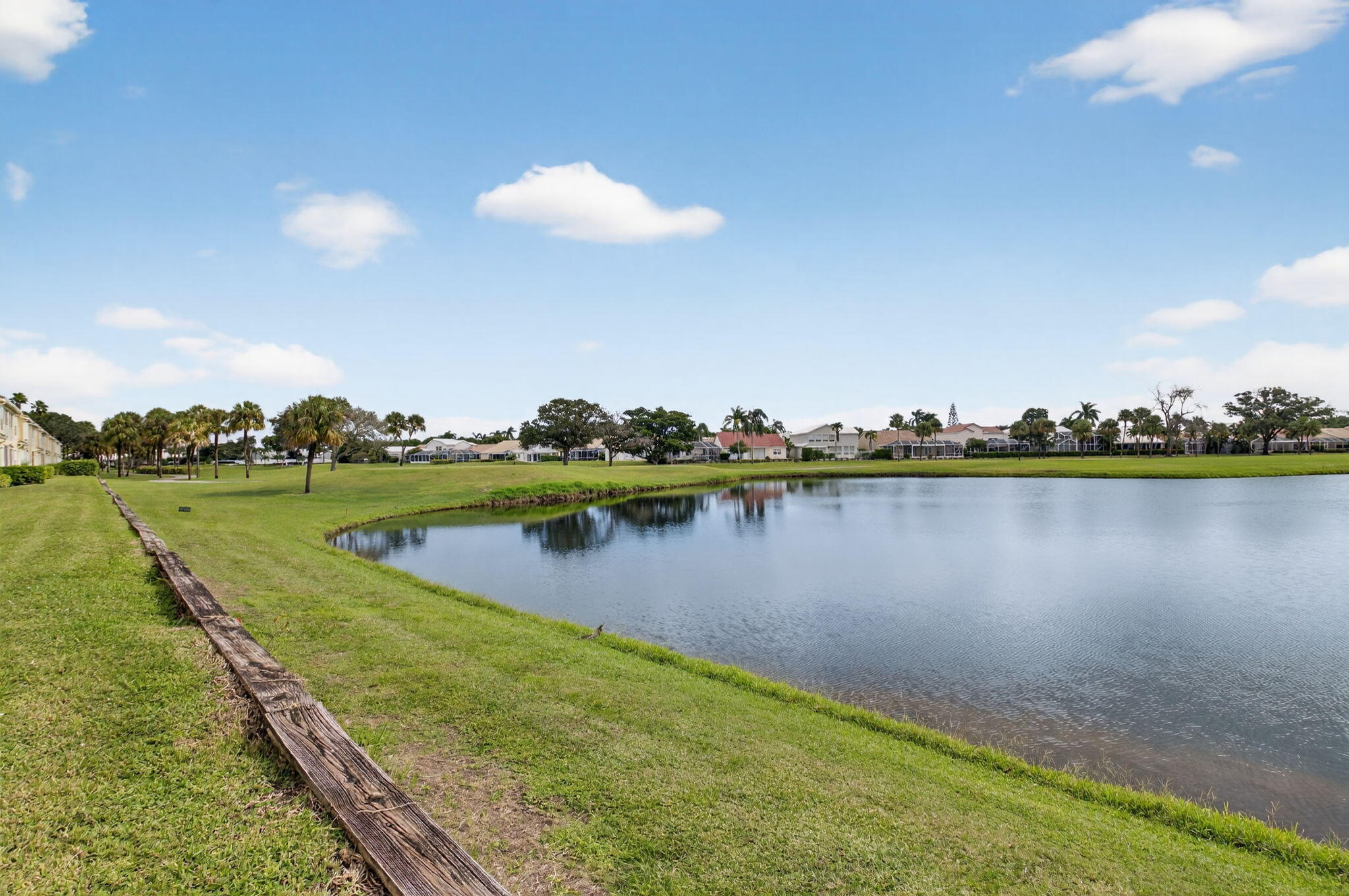 17287 Boca Club Boulevard, Unit 1 Boca Raton, FL 33487 - Photo 28 of 28 a view of a lake with a outdoor space