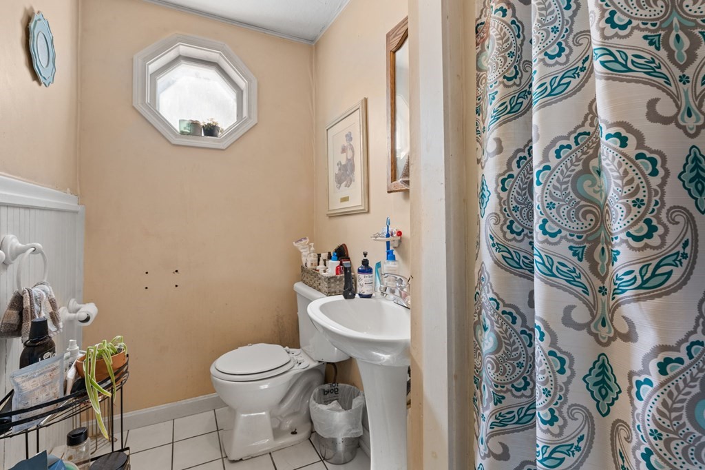 21 Russell Street Taunton, MA 02780 - Photo 15 of 42 a bathroom with a toilet and a sink
