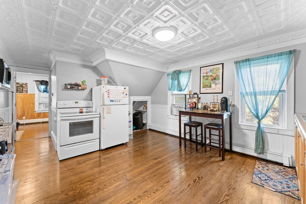21 Russell Street Taunton, MA 02780 - Photo 26 of 42 a view of kitchen with furniture and wooden floor