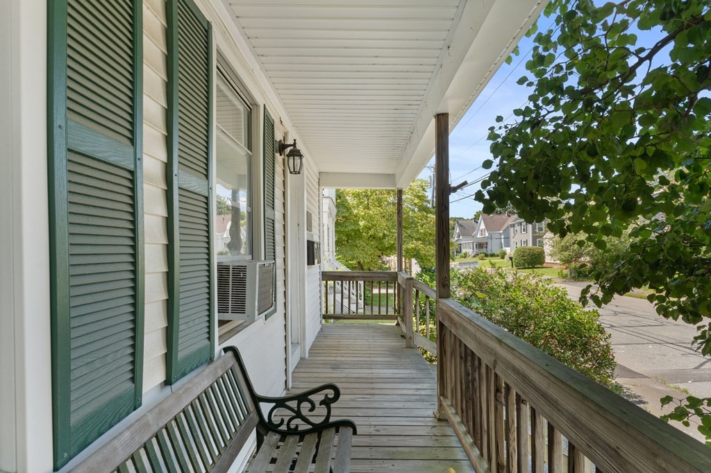 21 Russell Street Taunton, MA 02780 - Photo 3 of 42 a view of a balcony with wooden floor