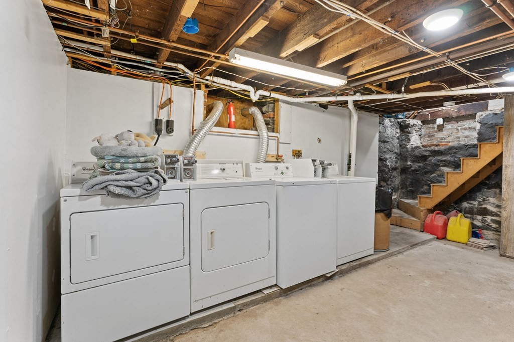21 Russell Street Taunton, MA 02780 - Photo 37 of 42 a utility room with dryer and washer