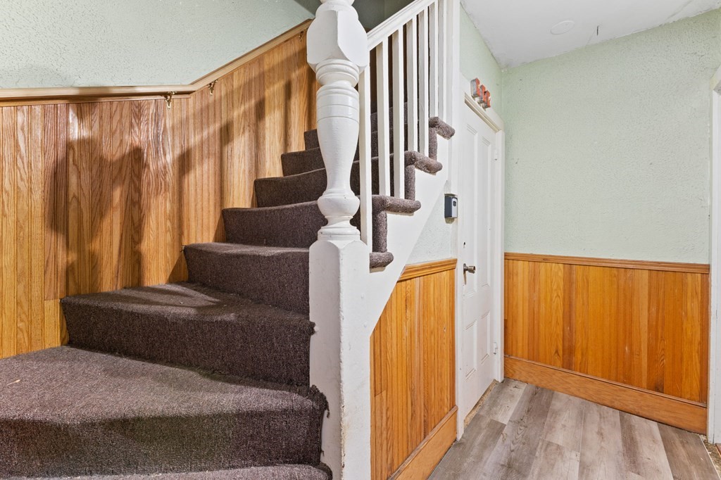 21 Russell Street Taunton, MA 02780 - Photo 5 of 42 a view of entryway and hall with wooden floor