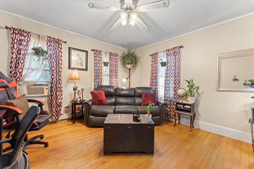 21 Russell Street Taunton, MA 02780 - Photo 8 of 42 a living room with furniture and a flat screen tv