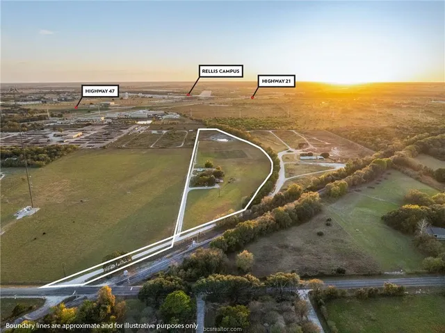 a kitchen with kitchen island a counter top space stainless steel appliances and cabinets