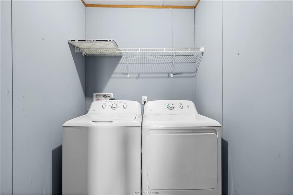2361 Smetana Road Bryan, TX 77807 - Photo 13 of 32 a utility room with dryer and washer