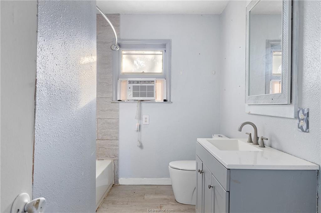 2361 Smetana Road Bryan, TX 77807 - Photo 29 of 32 a bathroom with a sink a toilet and shower