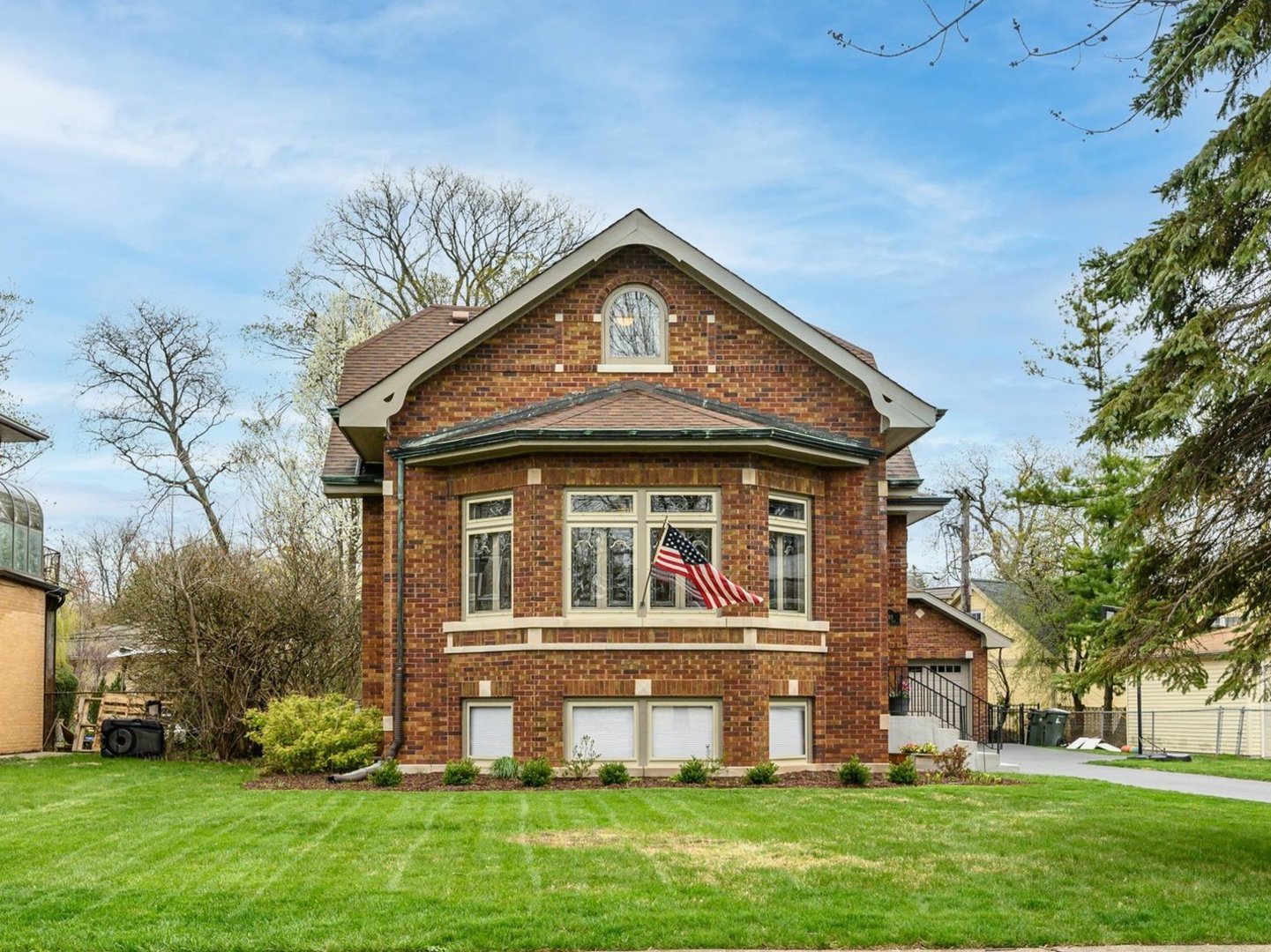 285 Nuttall Road Riverside, IL 60546 - Photo 1 of 27 a front view of a house with garden