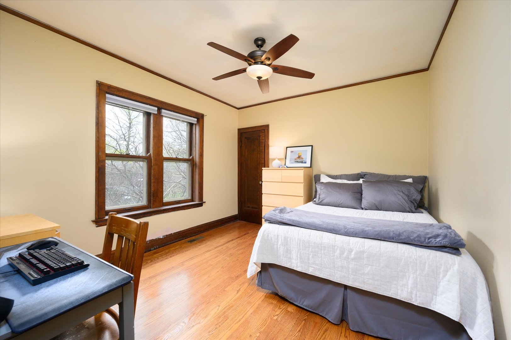285 Nuttall Road Riverside, IL 60546 - Photo 12 of 27 a living room with a bed furniture and a window