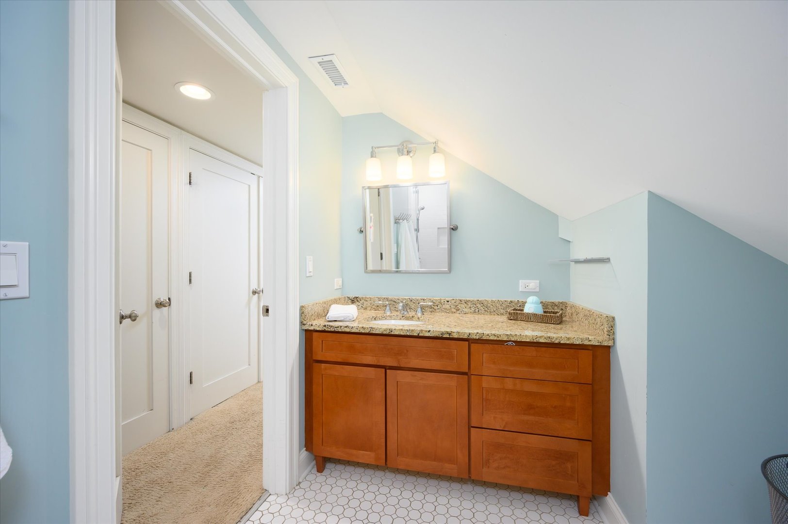 285 Nuttall Road Riverside, IL 60546 - Photo 21 of 27 a bathroom with a granite countertop sink a mirror and a