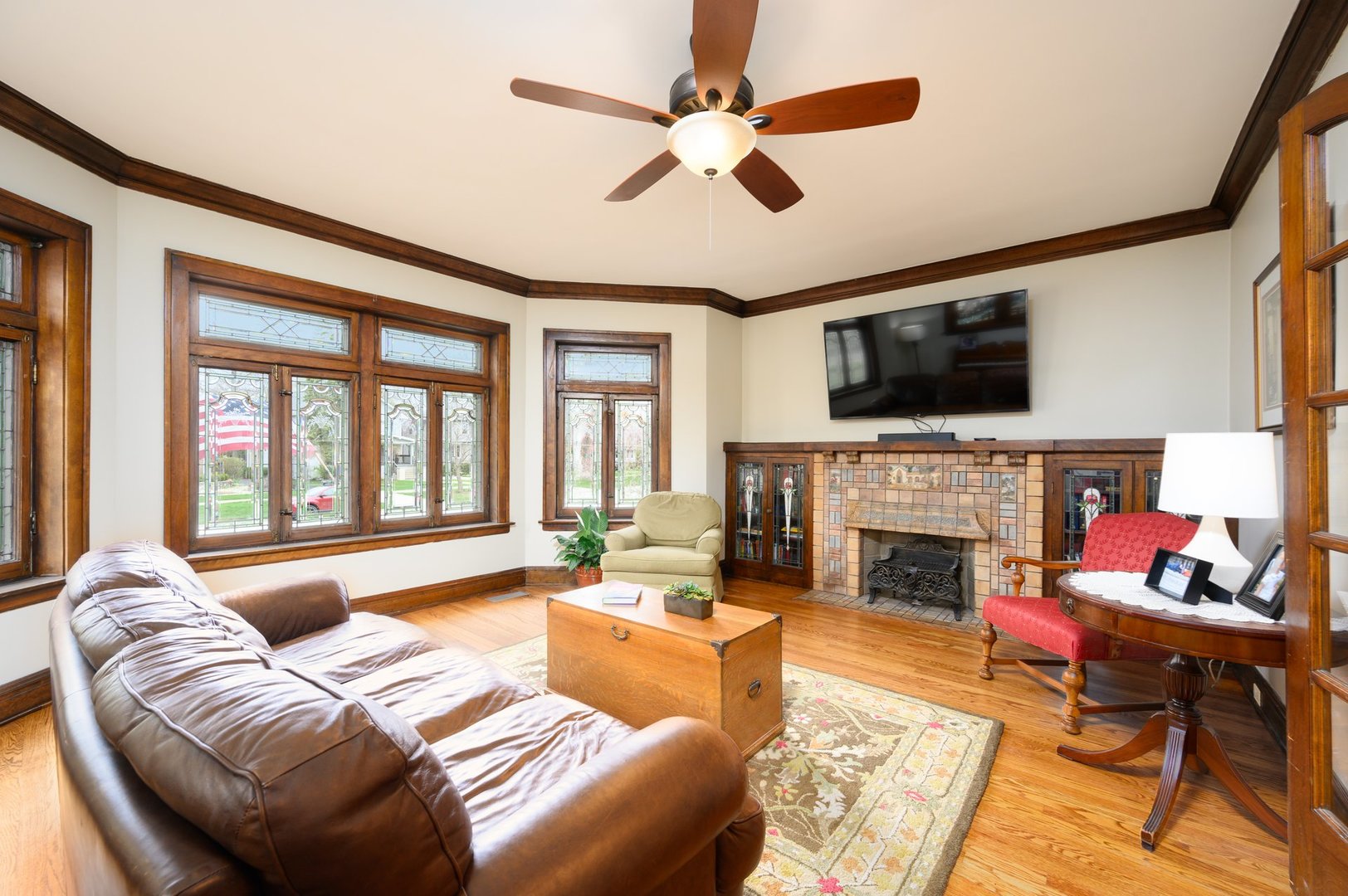 285 Nuttall Road Riverside, IL 60546 - Photo 5 of 27 a living room with fireplace furniture and a flat screen tv
