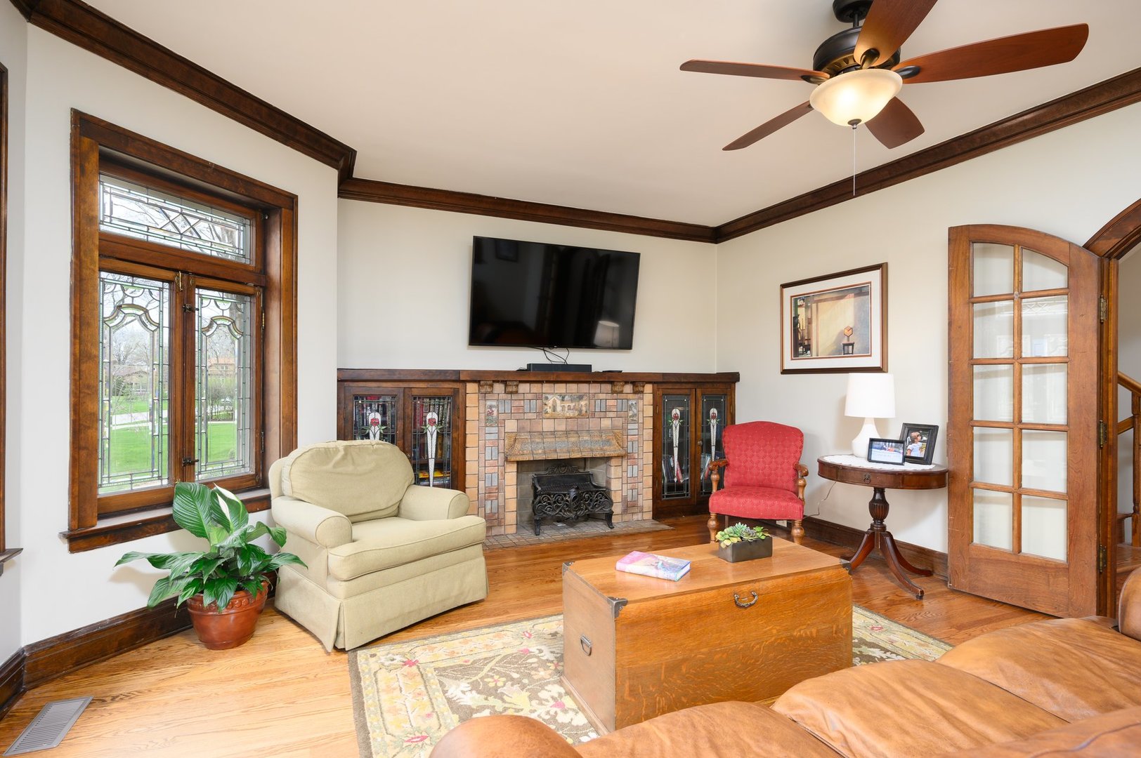 285 Nuttall Road Riverside, IL 60546 - Photo 7 of 27 a living room with furniture fireplace and a flat screen tv