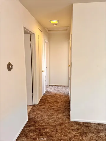 a view of a backyard of the house