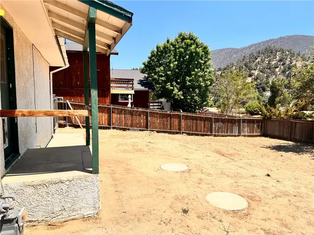 a view of swimming pool with a yard